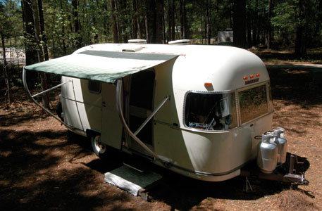While the classic Airstream trailer may look like a shiny aluminum tin can or bear a faint resemblance to the robot in Lost in Space, it can become a cozy, self-contained eco-home and office, as Claire and Shawn have proven. They even give mini-courses, short workshops, and small soapbox lectures to help educate others who want to live a more sustainable nomadic life.